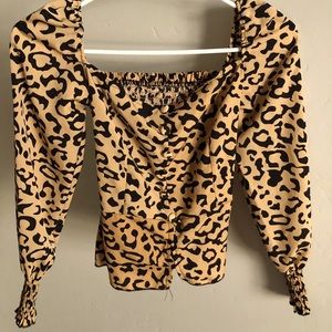 Forever21 Cheetah print top with princess sleeves.